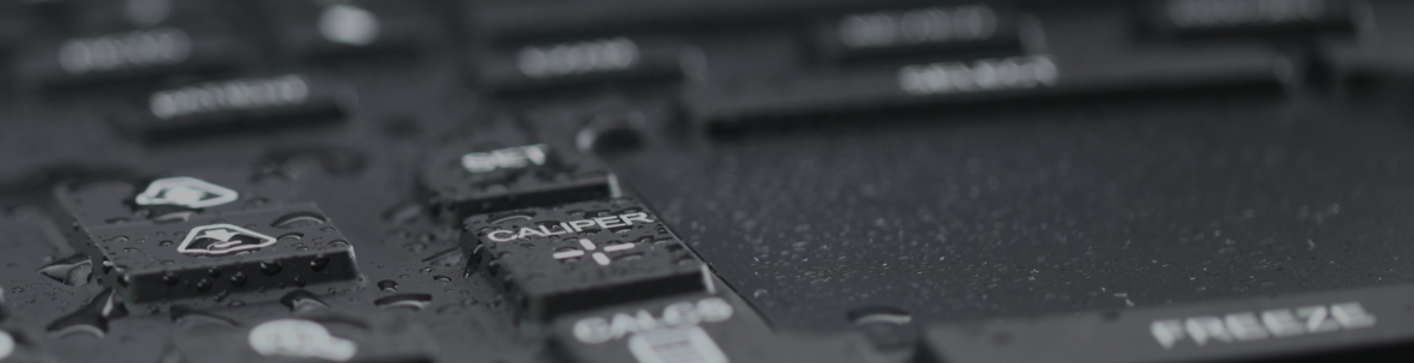 Close-up of the SonoSite Edge sealed keypad, beaded with water.